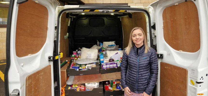 Chloe Stanford delivering food hampers to those in need